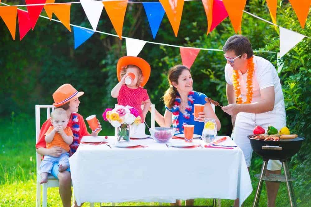 decorated backyard with a family of 5 celebrating at home during quarantine