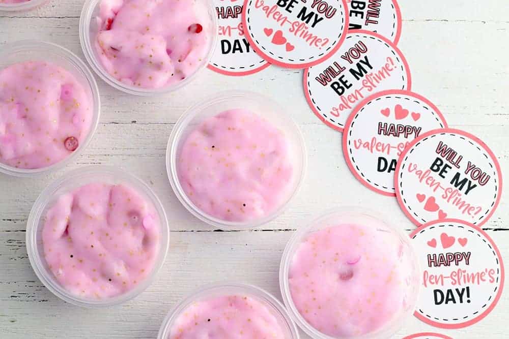 slime valentine with printable gift tags in takeout containers