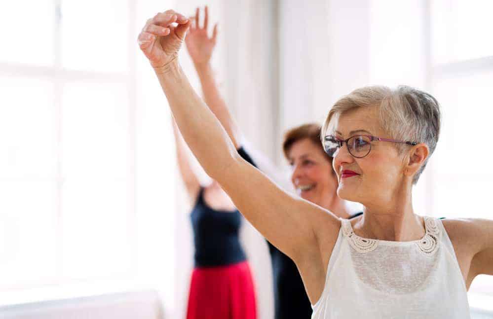 senior females taking ballet class