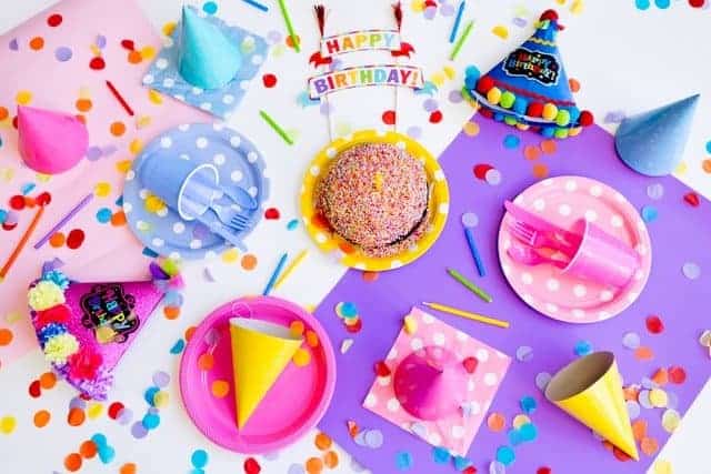 colorful party decorations in a flat lay