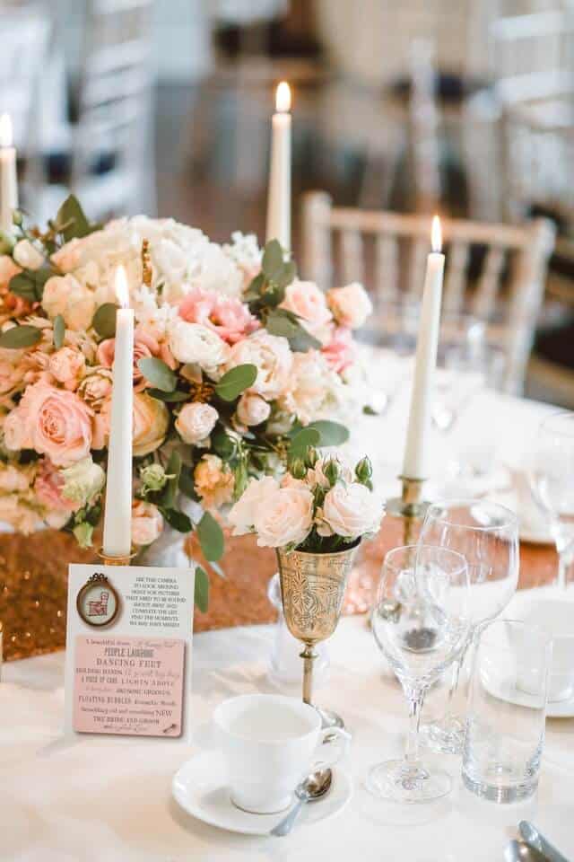beautiful bridal shower tablescape with roses and candles