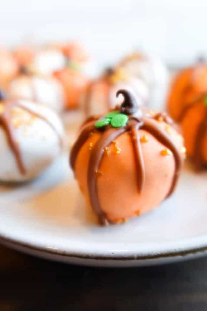 pumpkin bites decorated like fall pumpkins