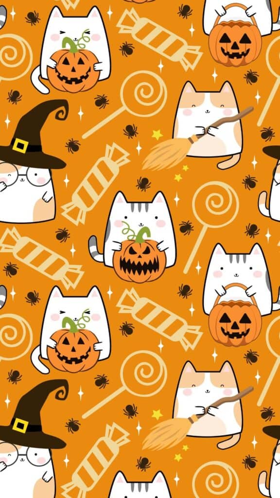 halloween wallpaper background image consisting of kawaii cats dressed up for halloween on orange backdrop